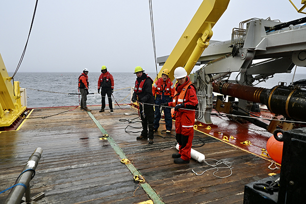 Expedition crew preparing to deploy the controlled-source electromagnetic (CSEM) system from IBRV Araon