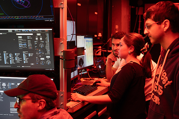 Graduate Fellows Javiera Fuentes Guíñez (center) and Vicente Andrés Sufán Osorio (right) with members of MBARI’s CoMPAS Lab during a test of new seafloor mapping algorithms-600