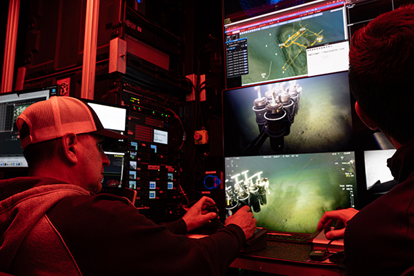 Senior Mechanical Technician/MiniROV Pilot Frank Flores flying MBARI’s MiniROV from a portable control room on the deck of IBRV Araon-600